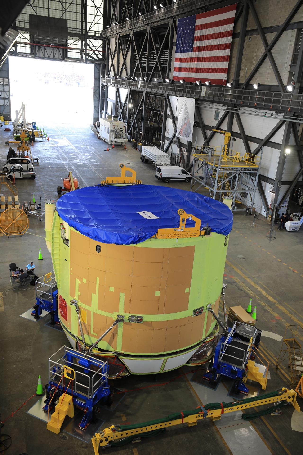 NASA aerospace manufacturing with an American flag