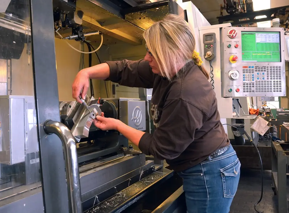 Machinist Margaret Paone operates a vertical milling machine at Watervliet Arsenal, New York, November 22, 2016.