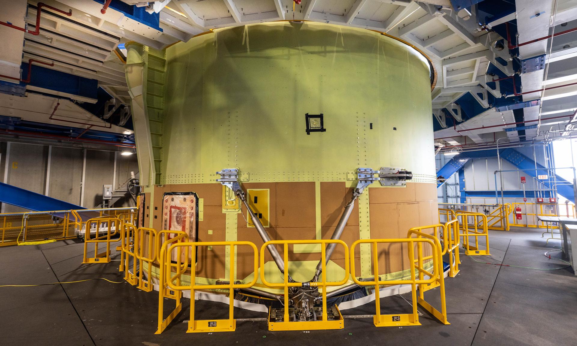 NASA technicians assembling Artemis hardware