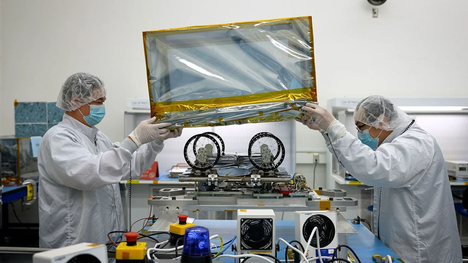 Engineers prepare a CADRE autonomous lunar rover for transport at NASA JPL in Southern California, January 29, 2025.