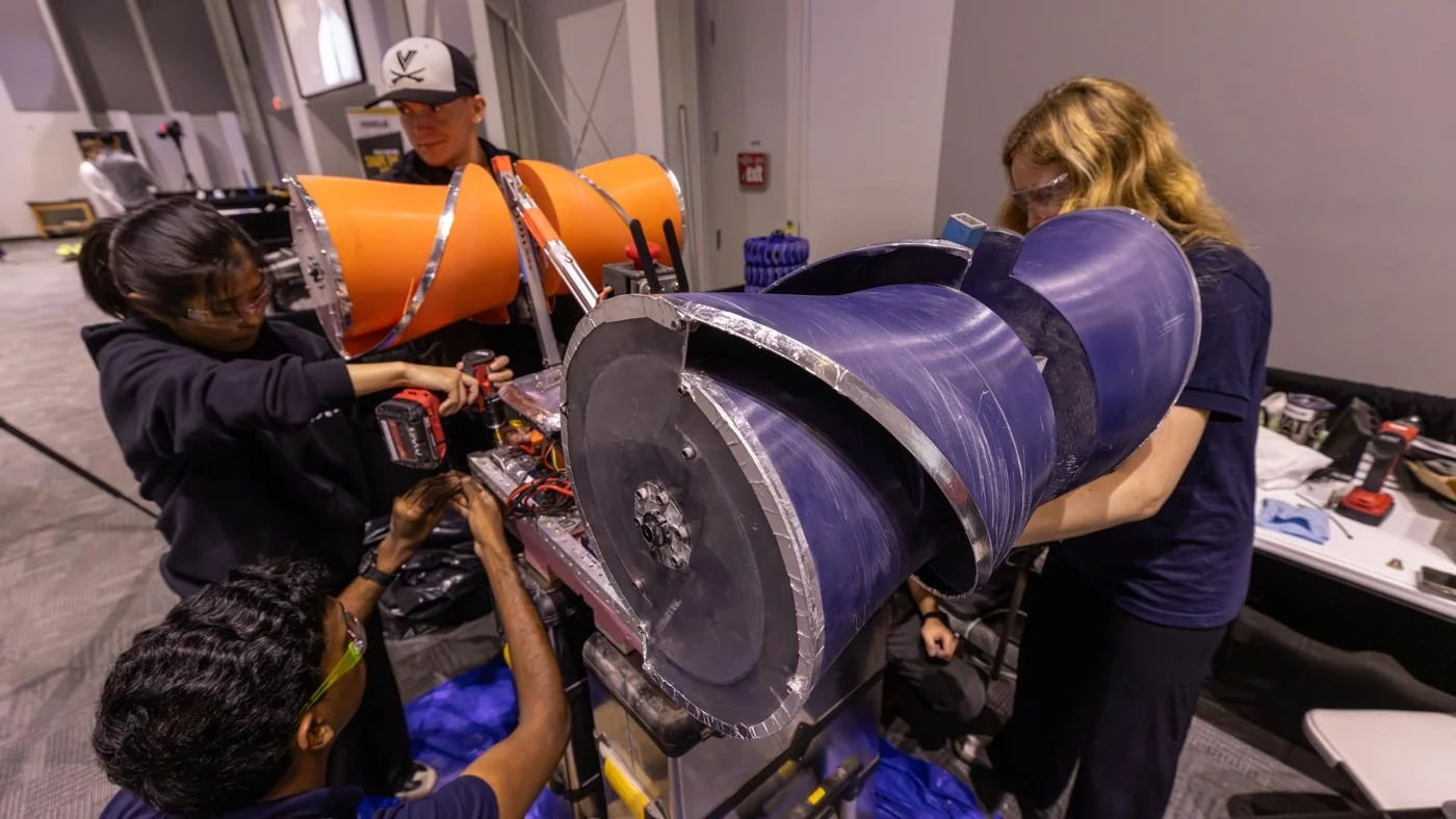 University of Virginia students prepare their prototype lunar robot during the 2026 Lunabotics Challenge finals at Kennedy Space Center Visitor Complex, Florida, May 20, 2026.