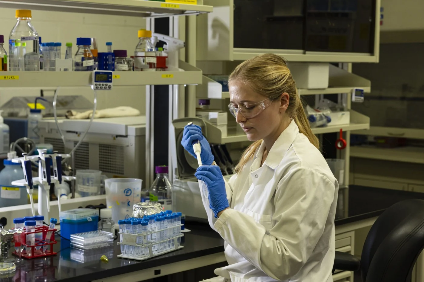 Synthetic biologist Rebecca Wilkes pipettes samples in a laboratory at Oak Ridge National Laboratory, Tennessee.